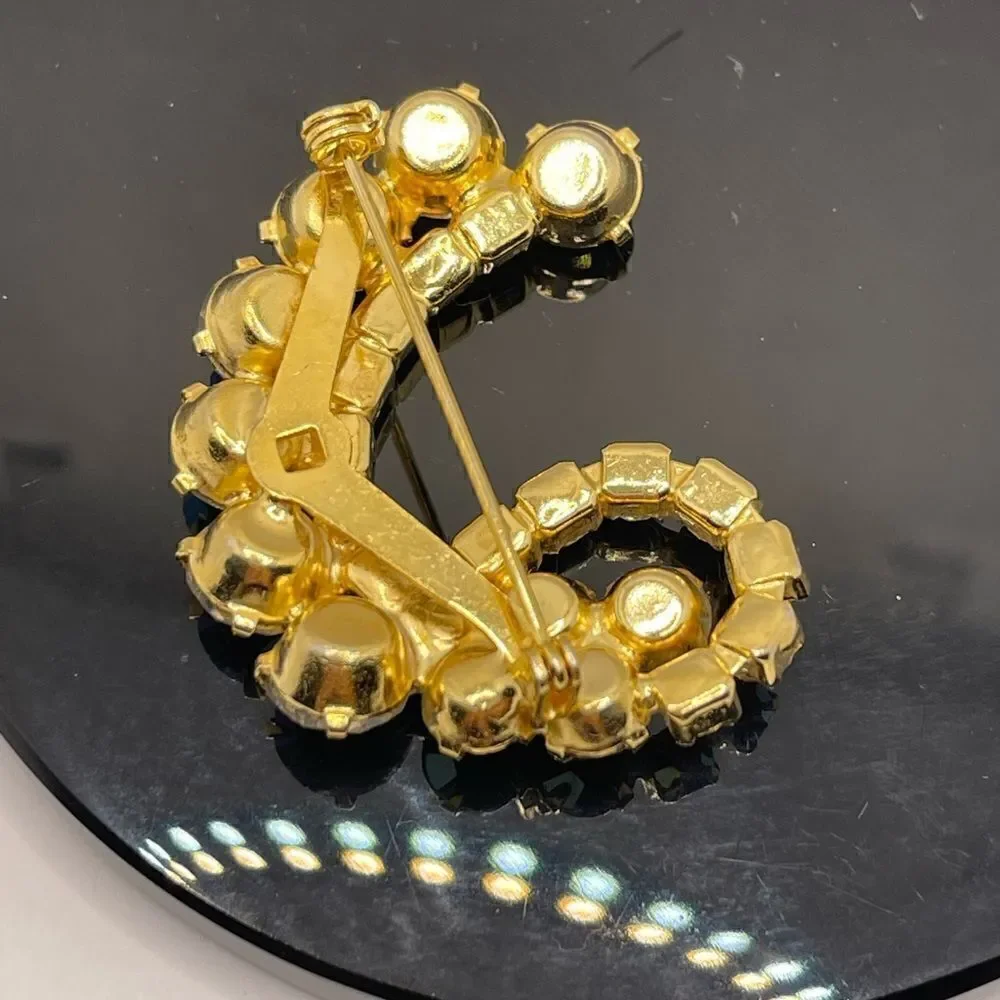 Vintage brooch aurora borealis gold tone